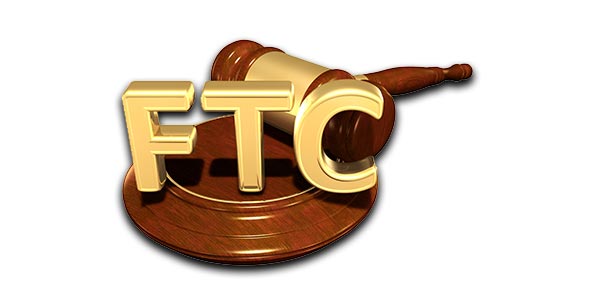 Rosewood gavel and sounding block with gold letters FTC floating in front.
